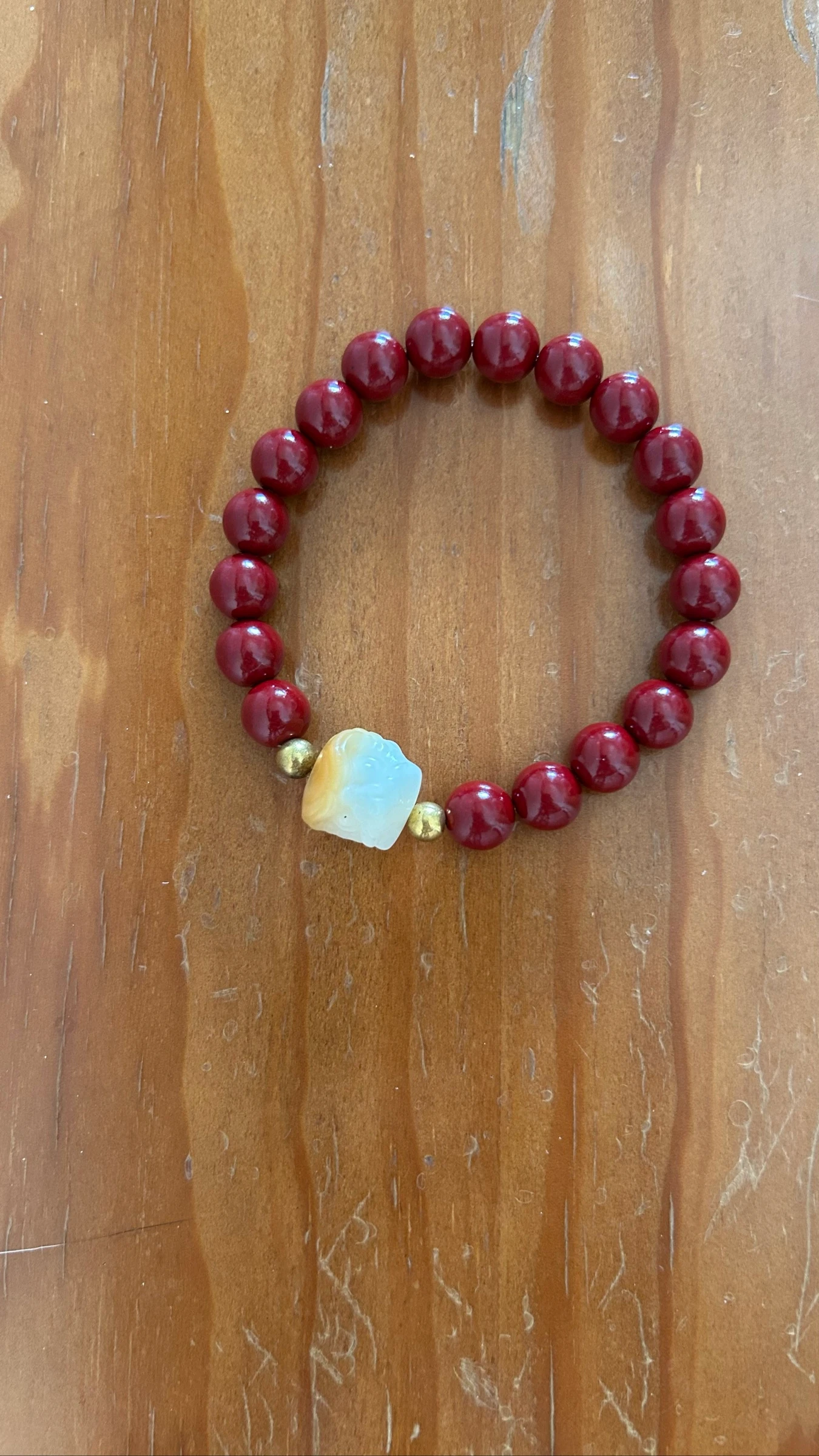 Pulseira em missangas de cinábrio e bodhi